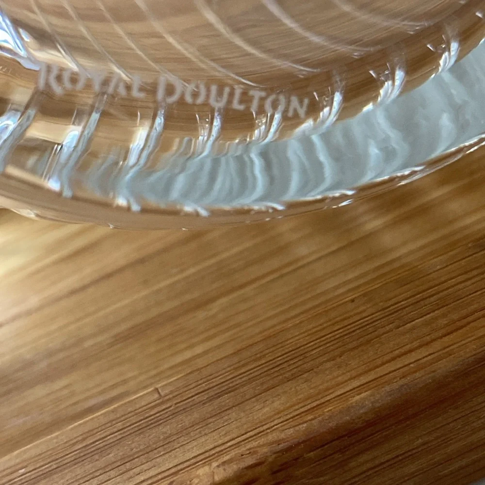 In great condition crystal Royal Doulton decanter with stopper .